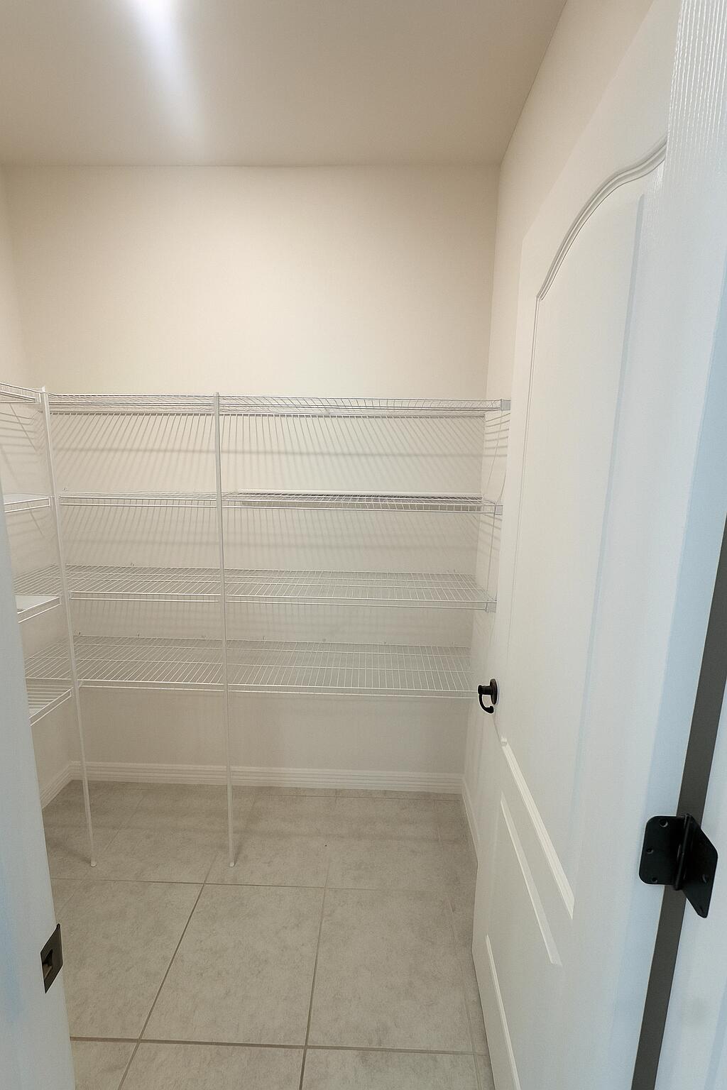 1963 Southwest Import Drive Port St. Lucie, FL 34953 - Photo 9 of 39 a bathroom with a bathtub