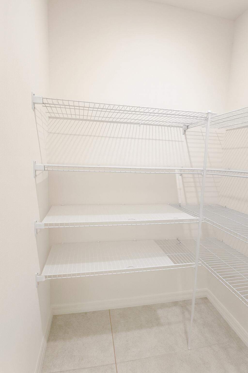 1963 Southwest Import Drive Port St. Lucie, FL 34953 - Photo 10 of 39 a bathroom with a bathtub