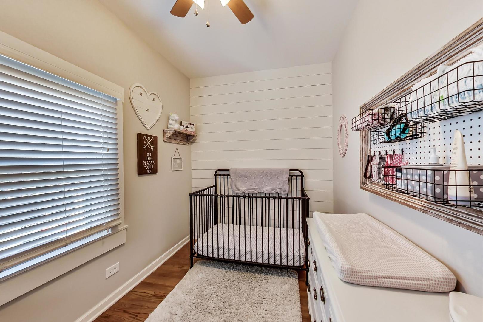 4214 North Kenmore Avenue, Unit 2F Chicago, IL 60613 - Photo 17 of 23 a bedroom with furniture and a window