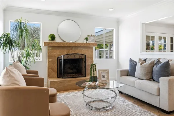a view of a dining room with furniture and a large window