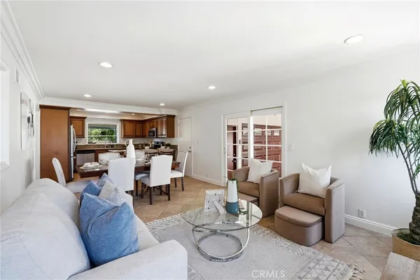 a kitchen with stainless steel appliances granite countertop a sink stove and microwave