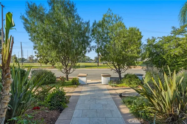 a view of a backyard with a patio