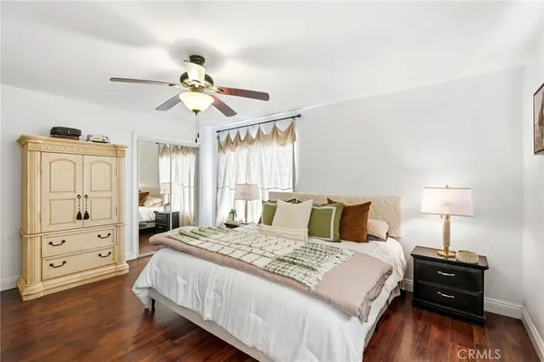 a bathroom with a shower a toilet and a bathtub