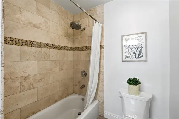 a view of a livingroom with a hardwood floor