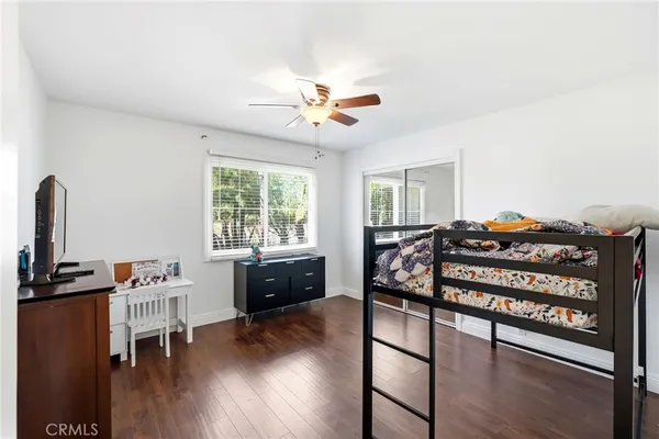 a view of a chairs and table in the patio