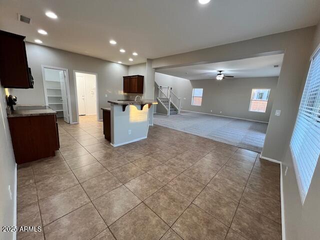 33578 North Sandstone Drive San Tan Valley, AZ 85143 - Photo 11 of 53 a living room with couches and kitchen view with wooden floor