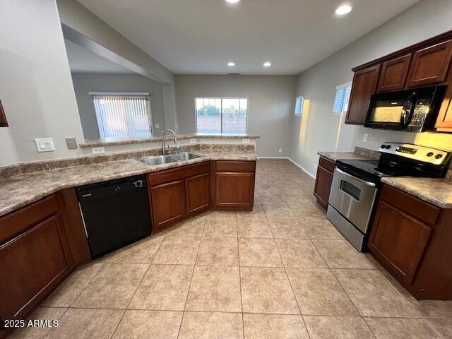 33578 North Sandstone Drive San Tan Valley, AZ 85143 - Photo 17 of 53 a kitchen with stainless steel appliances granite countertop a sink stove and granite counter tops