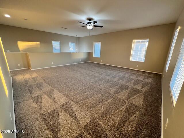 33578 North Sandstone Drive San Tan Valley, AZ 85143 - Photo 28 of 53 a view of a livingroom with a ceiling fan and window