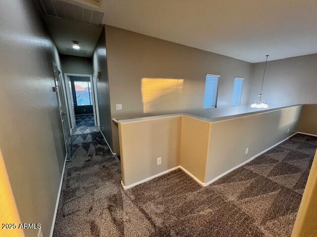 33578 North Sandstone Drive San Tan Valley, AZ 85143 - Photo 29 of 53 a view of a hallway to a room with wooden floor