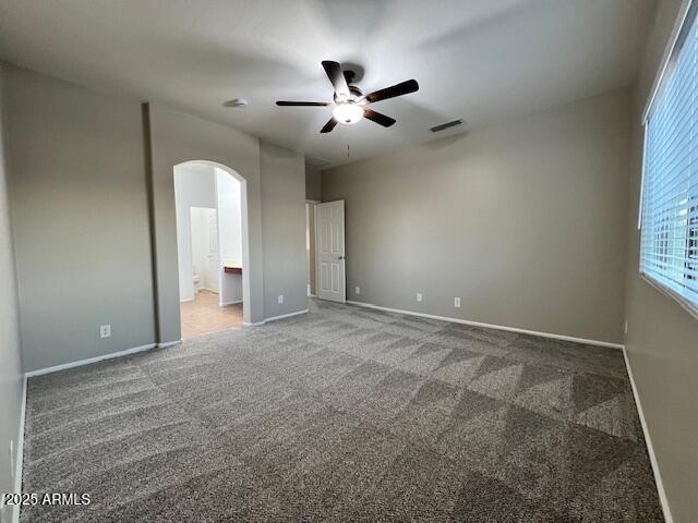 33578 North Sandstone Drive San Tan Valley, AZ 85143 - Photo 39 of 53 a view of a livingroom with a ceiling fan and window