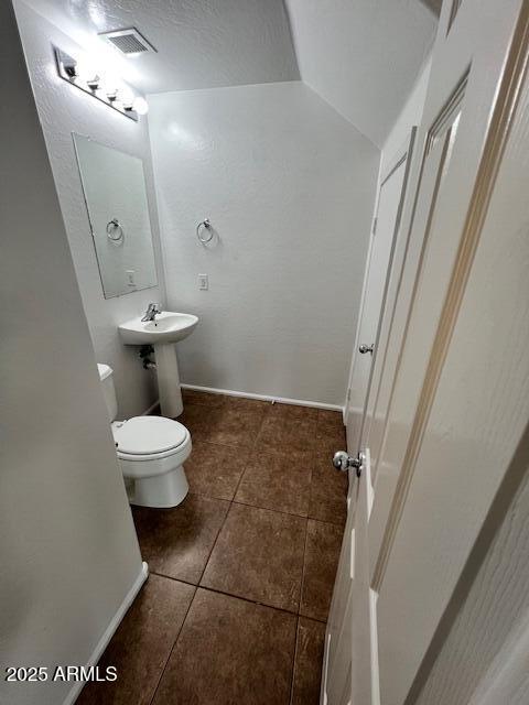 33578 North Sandstone Drive San Tan Valley, AZ 85143 - Photo 7 of 53 a bathroom with a toilet and a sink