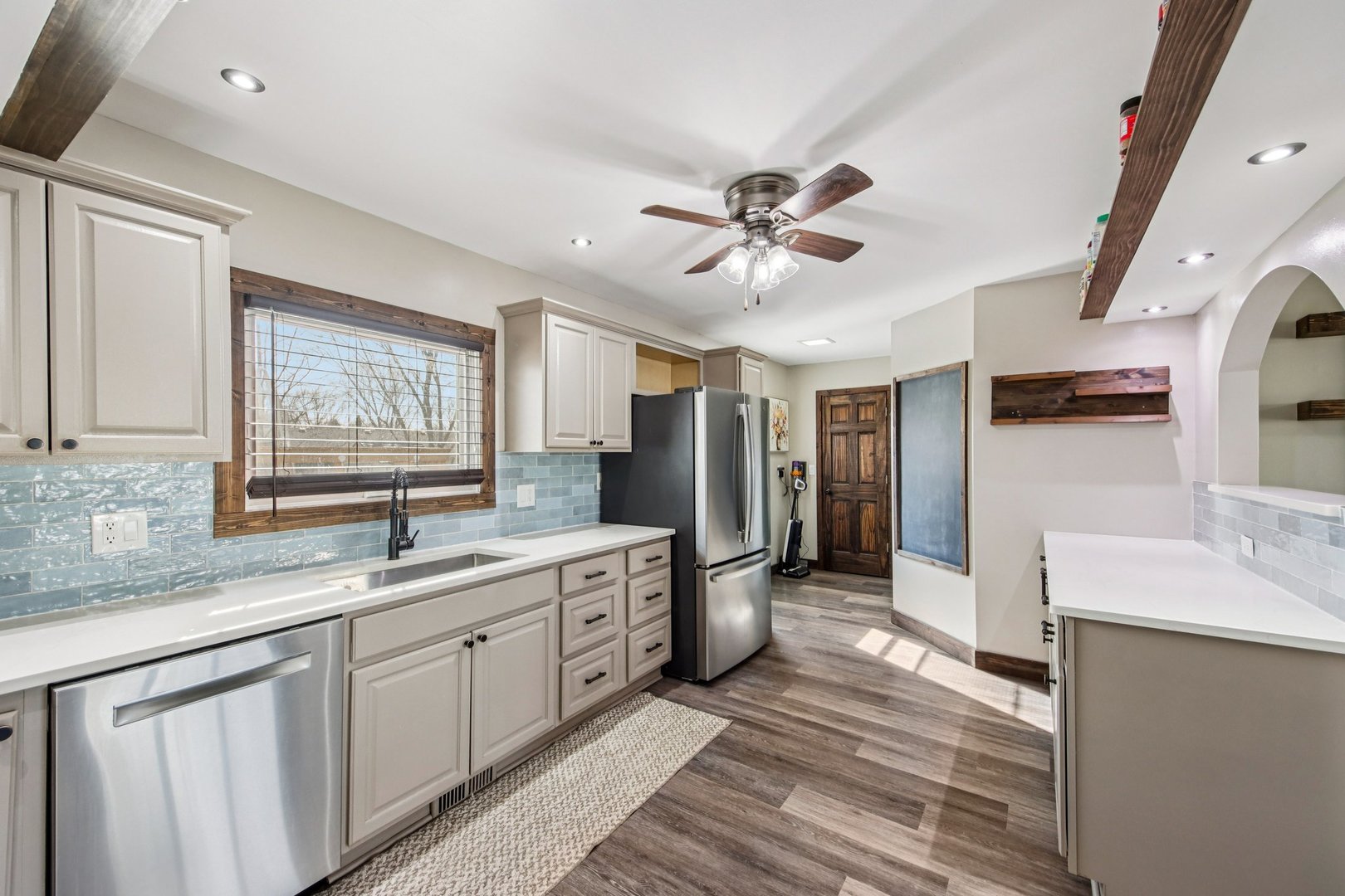 108 Davis Court Bolingbrook, IL 60440 - Photo 14 of 41 a large white kitchen with a large window