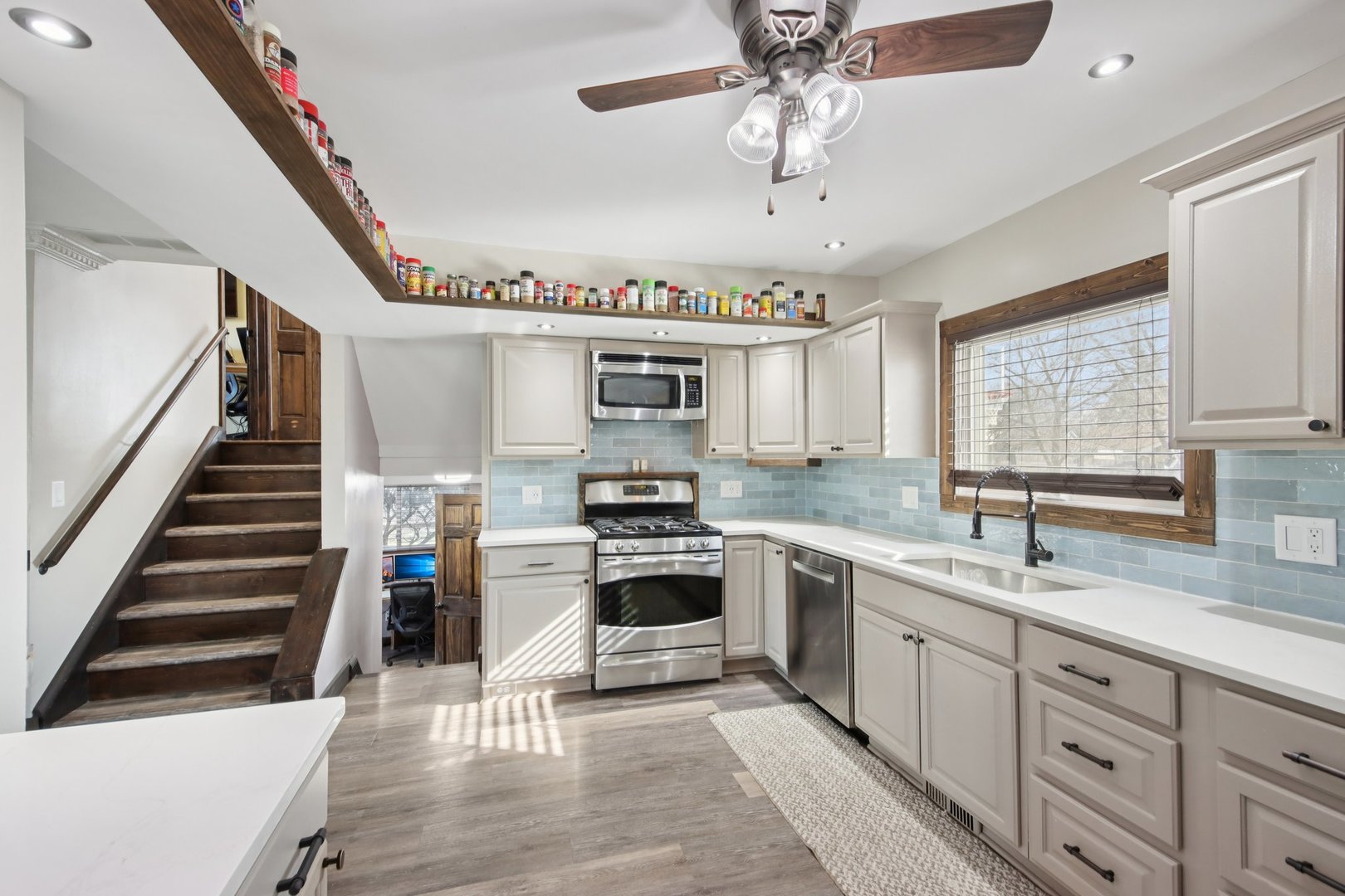 108 Davis Court Bolingbrook, IL 60440 - Photo 17 of 41 a kitchen with cabinets a sink and appliances