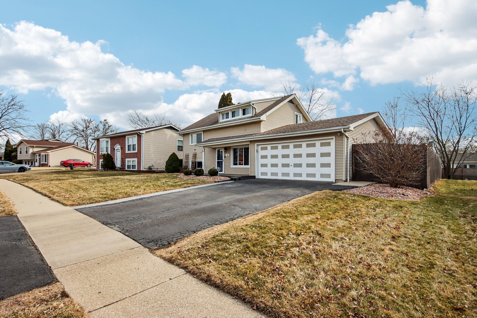 108 Davis Court Bolingbrook, IL 60440 - Photo 2 of 41 a front view of a house with a yard