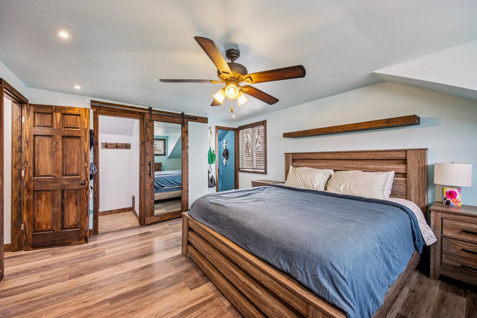 108 Davis Court Bolingbrook, IL 60440 - Photo 31 of 41 a bedroom with a large bed and a chandelier