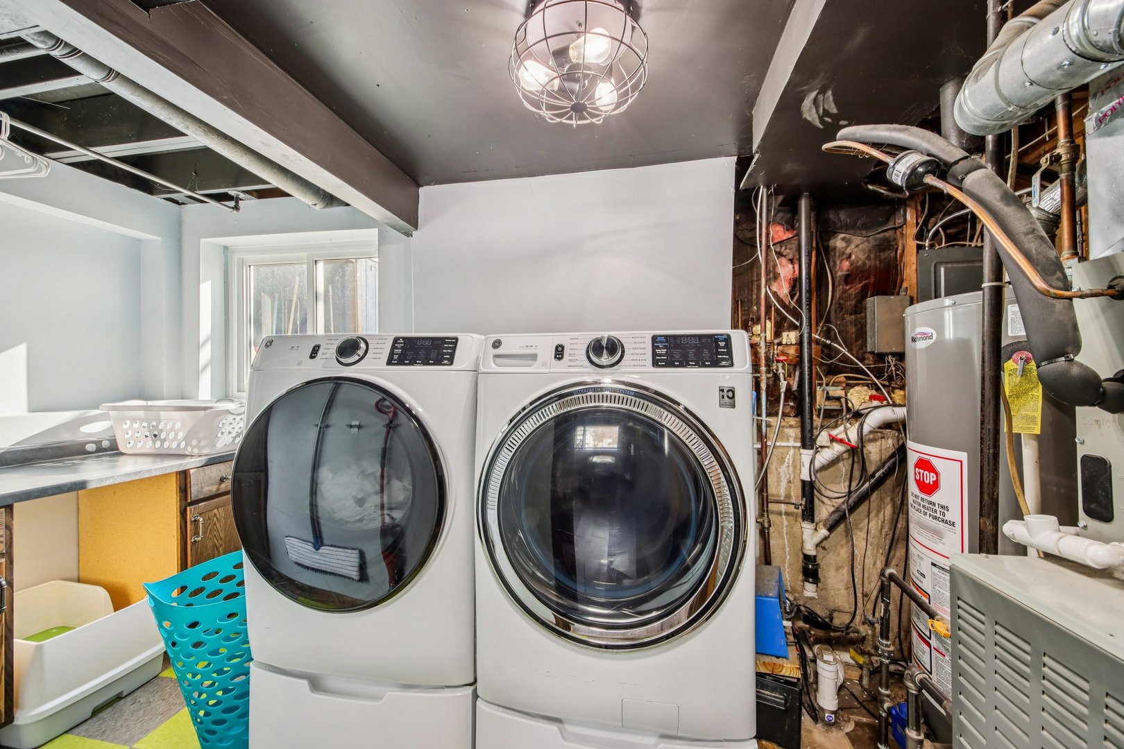 108 Davis Court Bolingbrook, IL 60440 - Photo 34 of 41 a view of a storage & utility room with a washer and dryer
