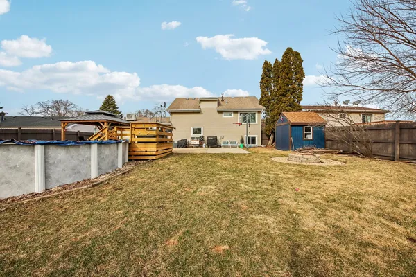 a view of a water fountain in front of the house