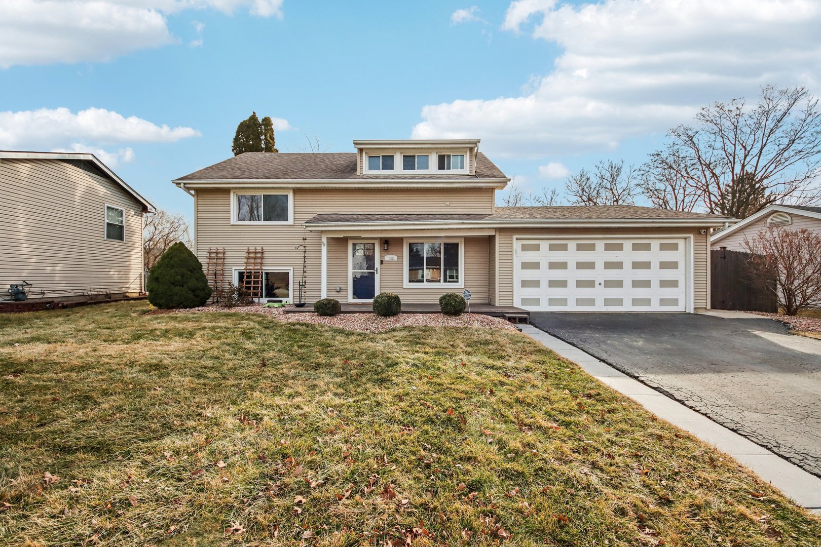 108 Davis Court Bolingbrook, IL 60440 - Photo 5 of 41 a front view of a house with a yard