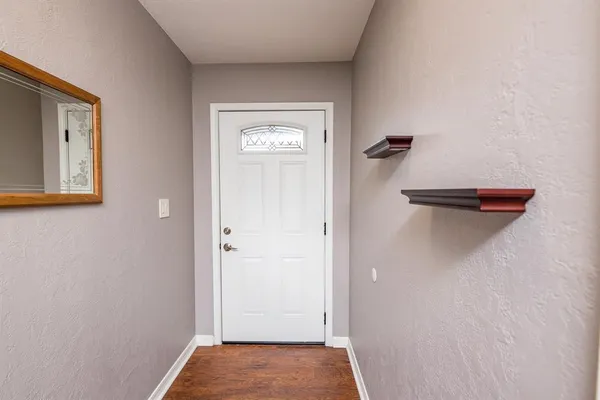 a view of a hallway with closet