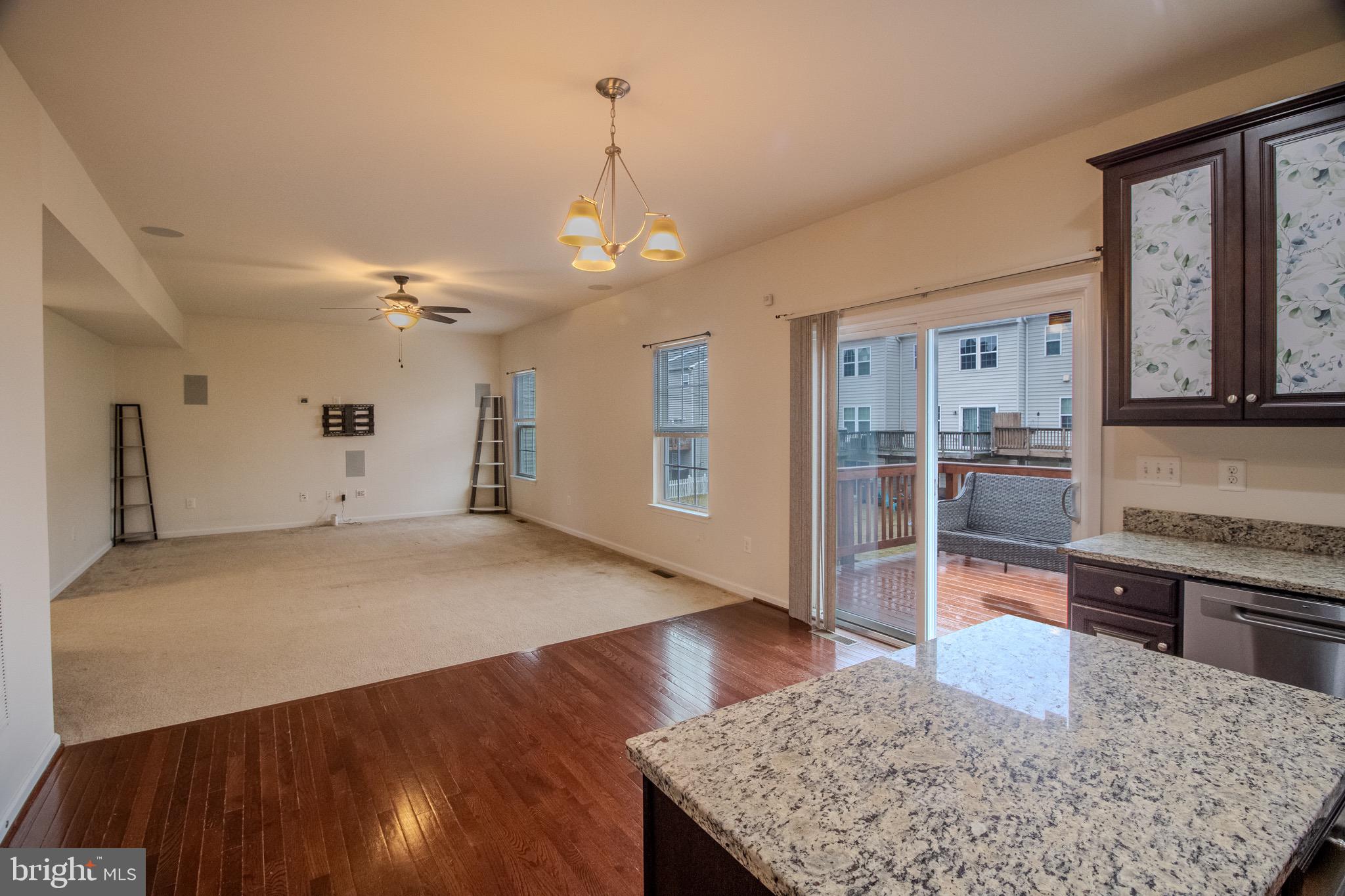 57 Tollerton Trail Falling Waters, WV 25419 - Photo 19 of 59 a view of a kitchen with granite countertop cabinets and refrigerator