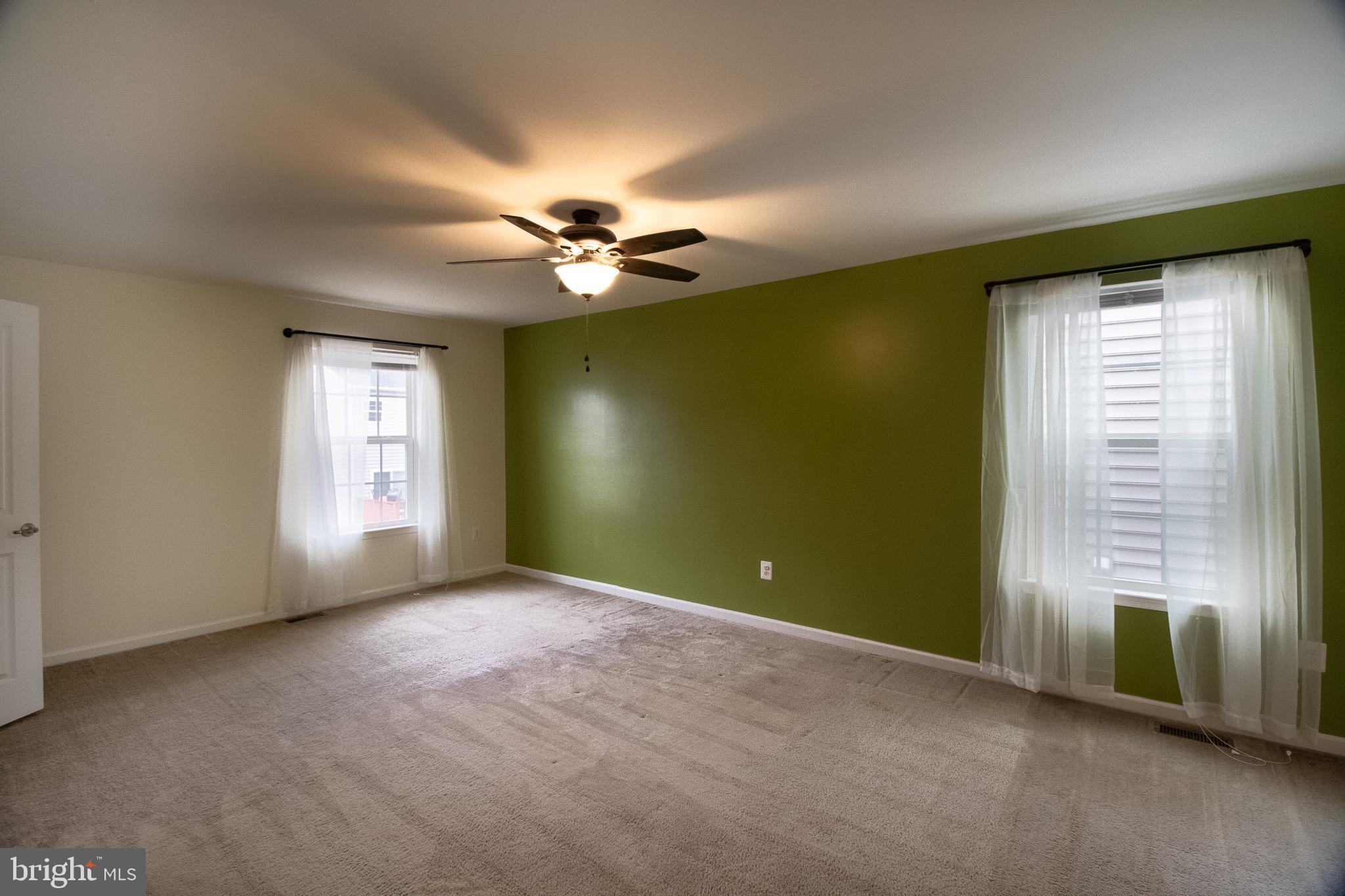 57 Tollerton Trail Falling Waters, WV 25419 - Photo 25 of 59 an empty room with windows and fan