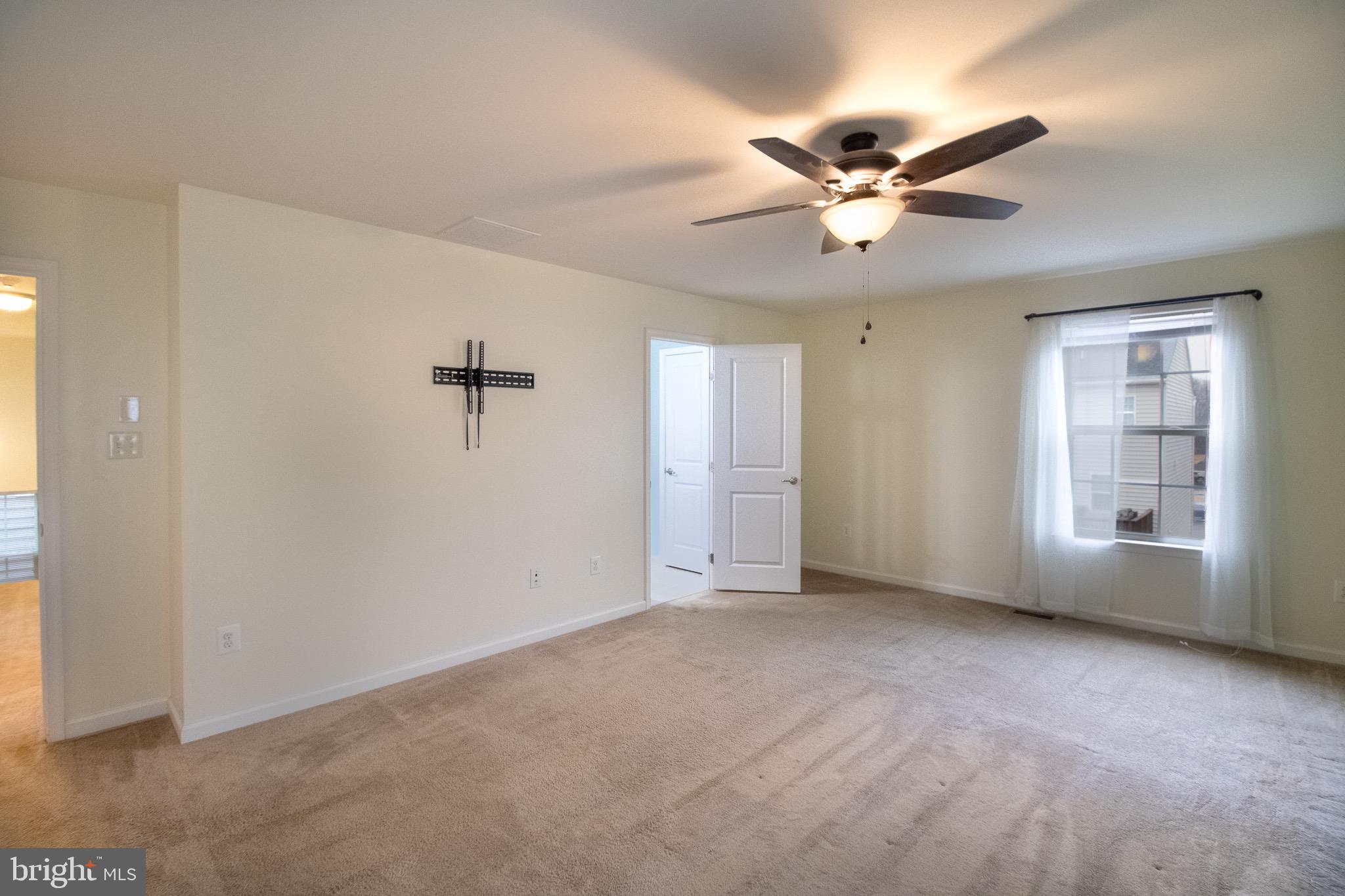 57 Tollerton Trail Falling Waters, WV 25419 - Photo 26 of 59 a view of an empty room with a window