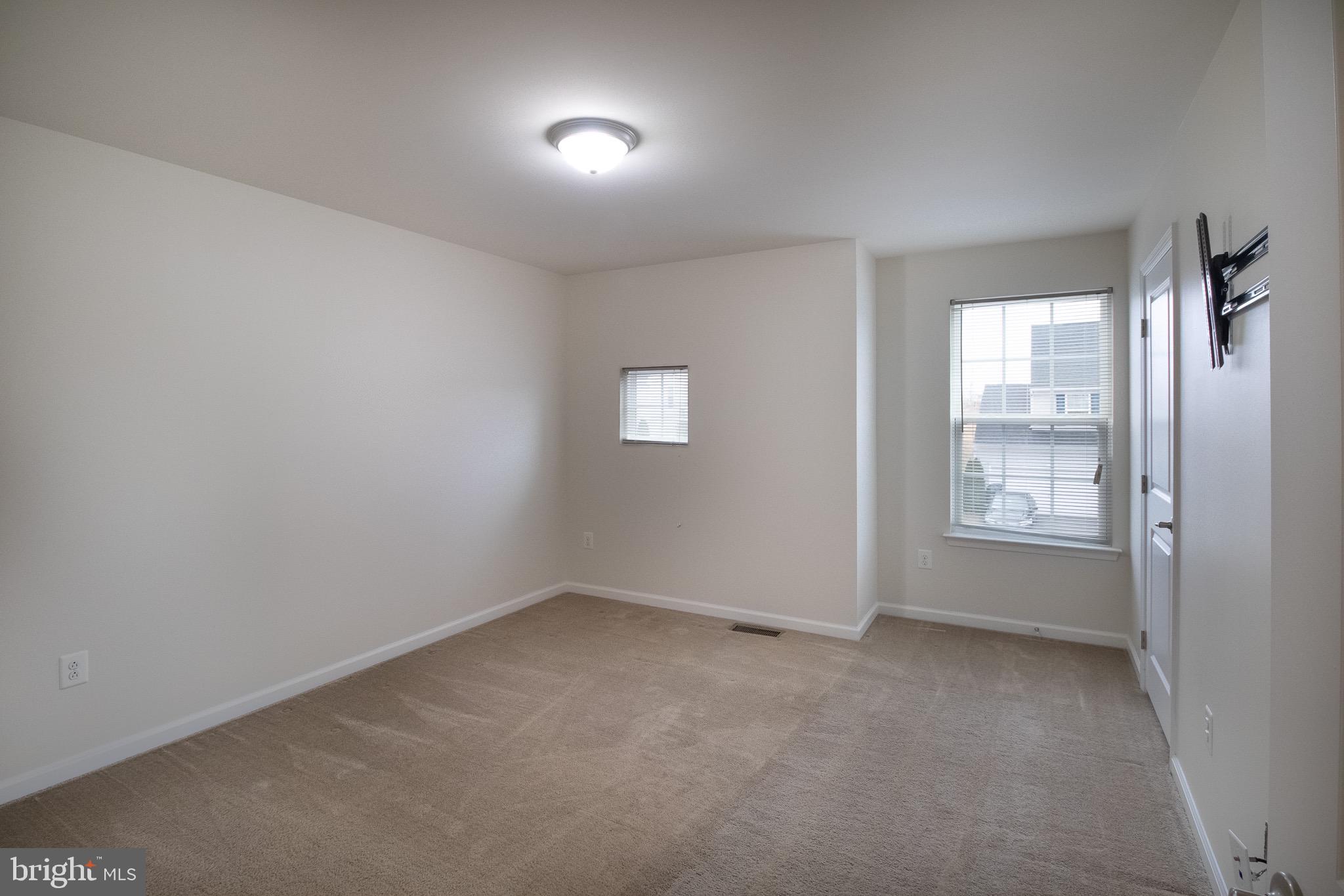 57 Tollerton Trail Falling Waters, WV 25419 - Photo 33 of 59 an empty room with windows