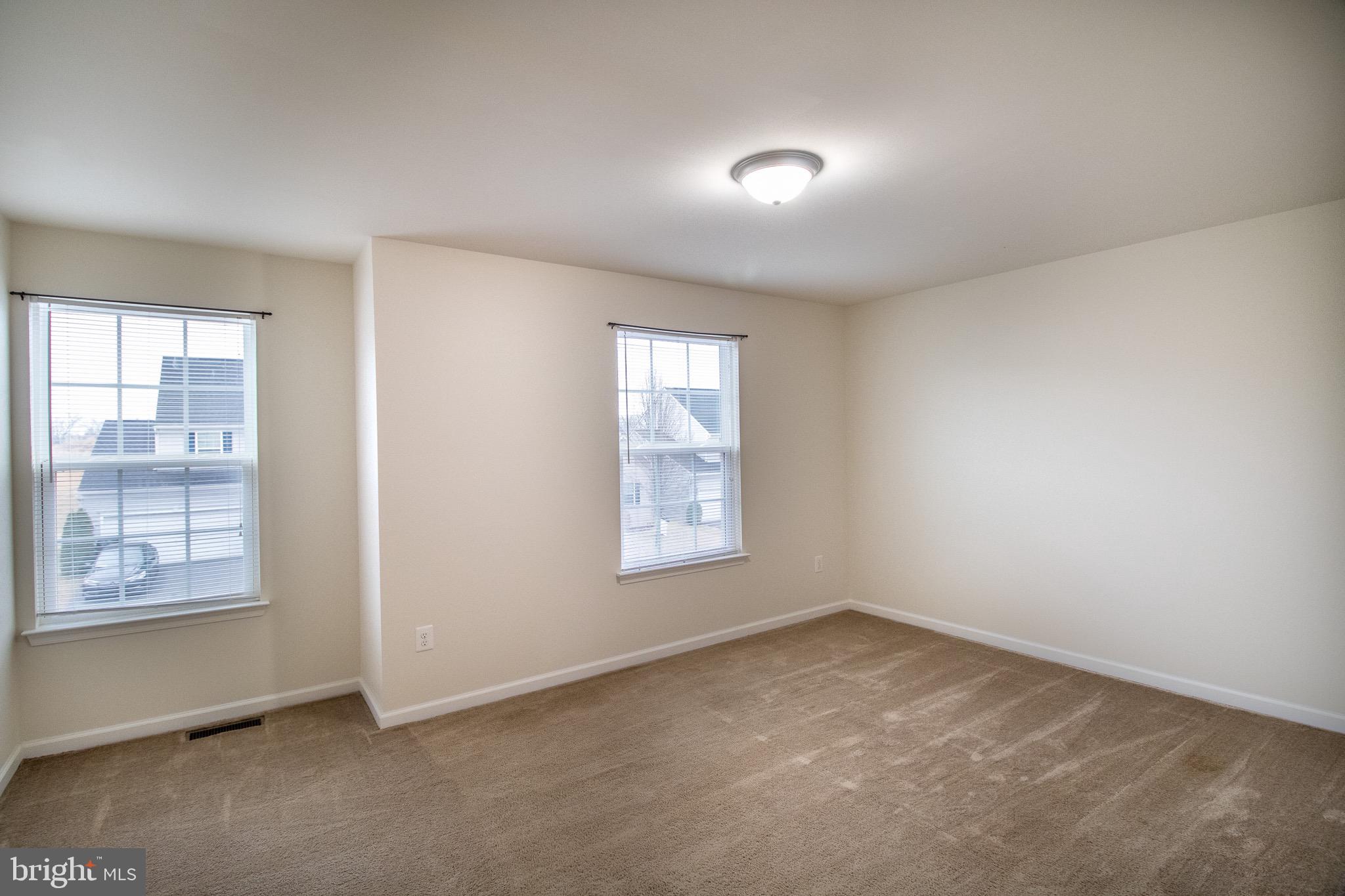 57 Tollerton Trail Falling Waters, WV 25419 - Photo 36 of 59 an empty room with windows