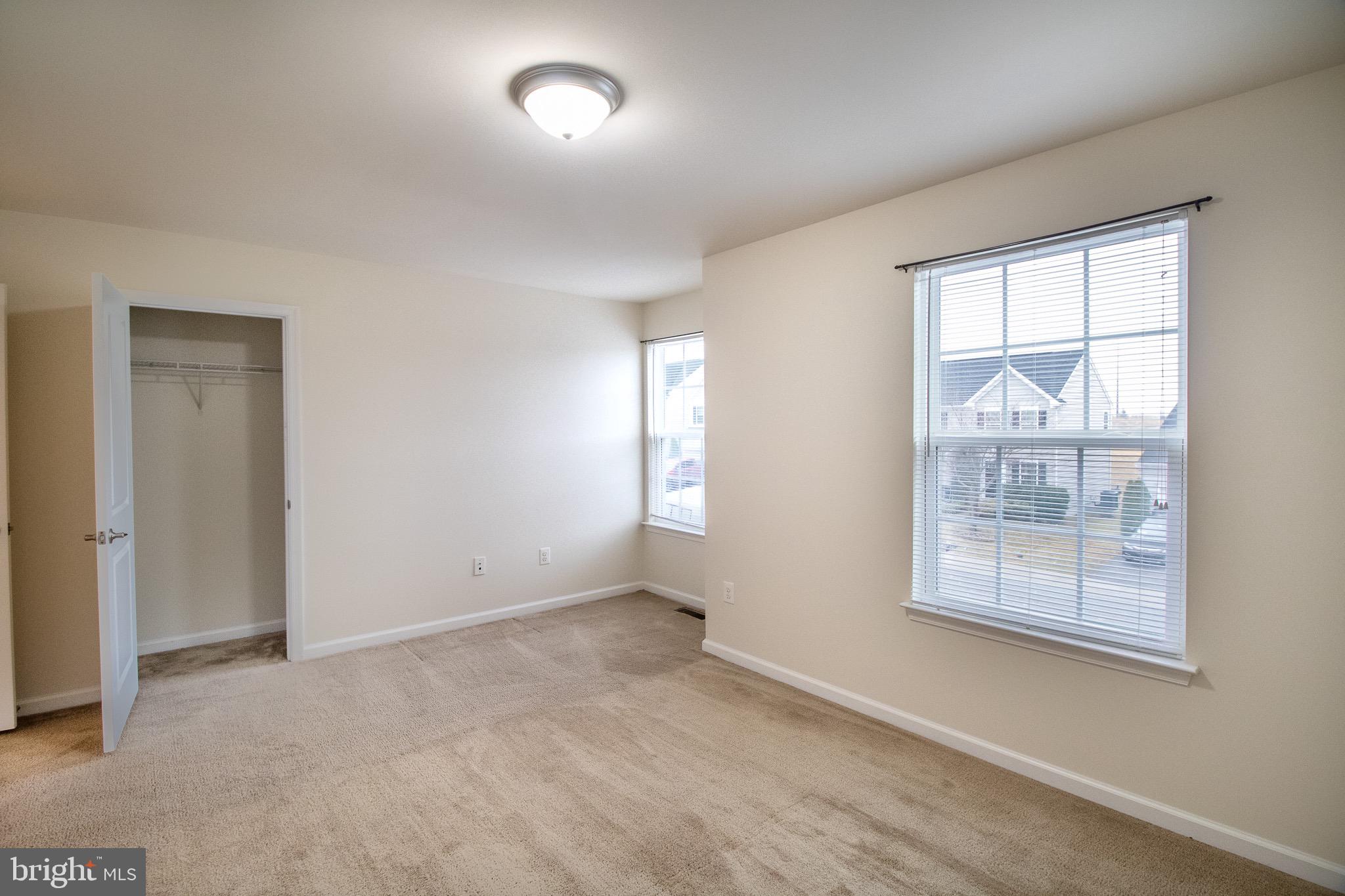 57 Tollerton Trail Falling Waters, WV 25419 - Photo 37 of 59 an empty room with windows