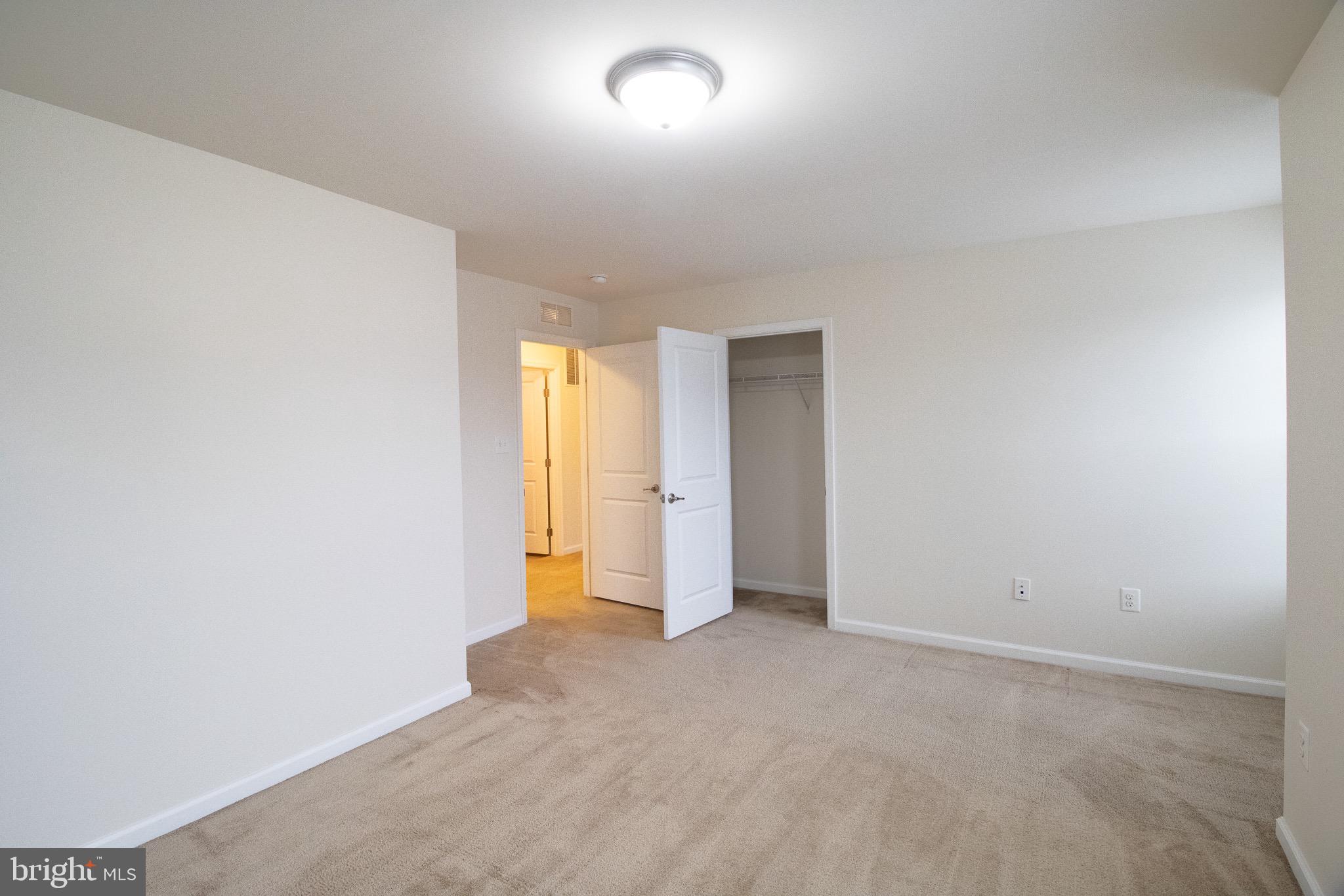 57 Tollerton Trail Falling Waters, WV 25419 - Photo 38 of 59 an empty room with a natural light