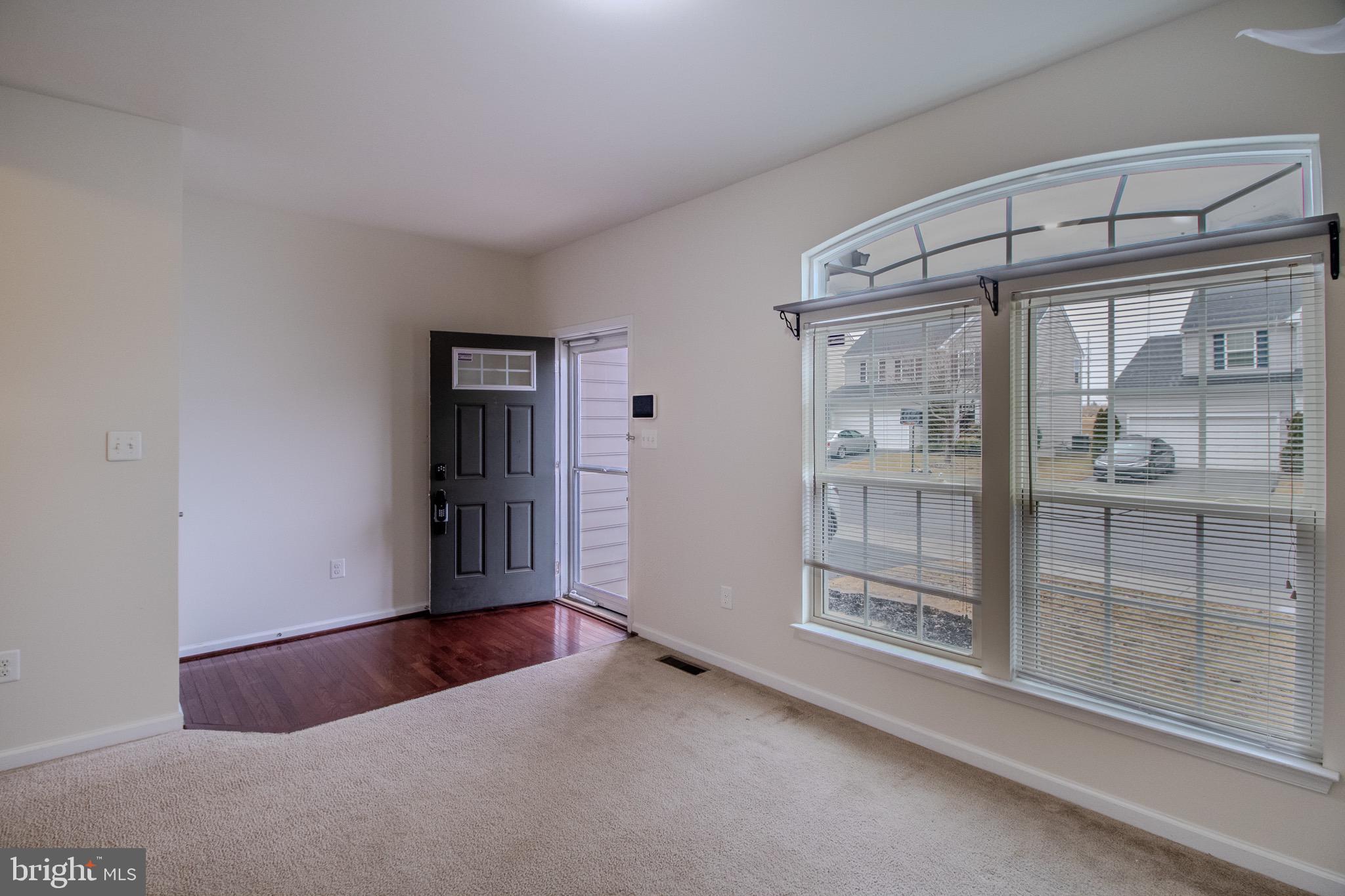 57 Tollerton Trail Falling Waters, WV 25419 - Photo 6 of 59 a view of an empty room and window