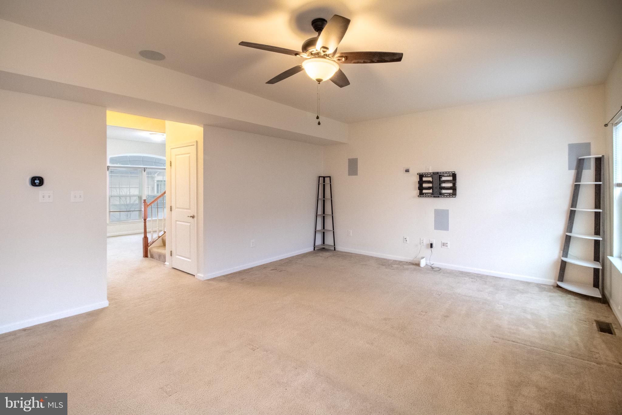 57 Tollerton Trail Falling Waters, WV 25419 - Photo 10 of 59 a view of an empty room with a window