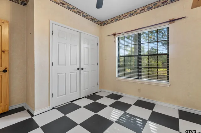 a view of a room with windows