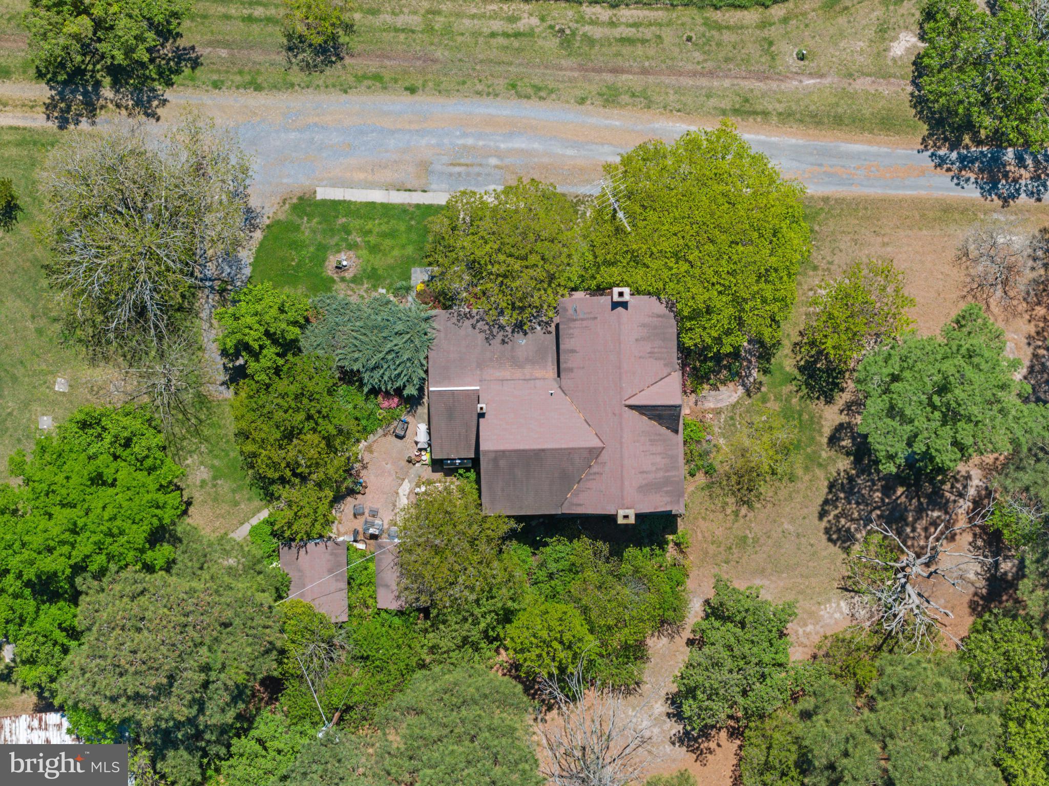 6033 Corners Wharf Road Cambridge, MD 21613 - Photo 5 of 11 an aerial view of a house with a yard
