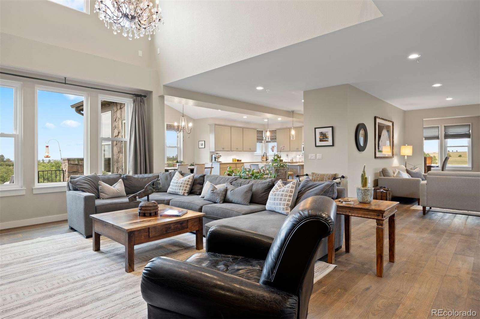 2940 Canon Ridge Road Castle Rock, CO 80104 - Photo 15 of 49 a living room with furniture and wooden floor