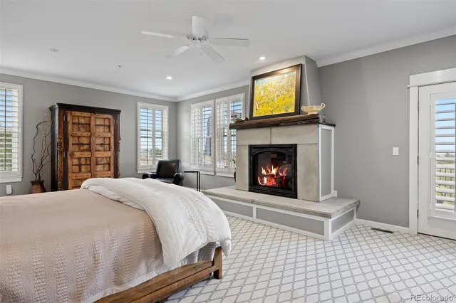 a bed room with a bed and a fireplace