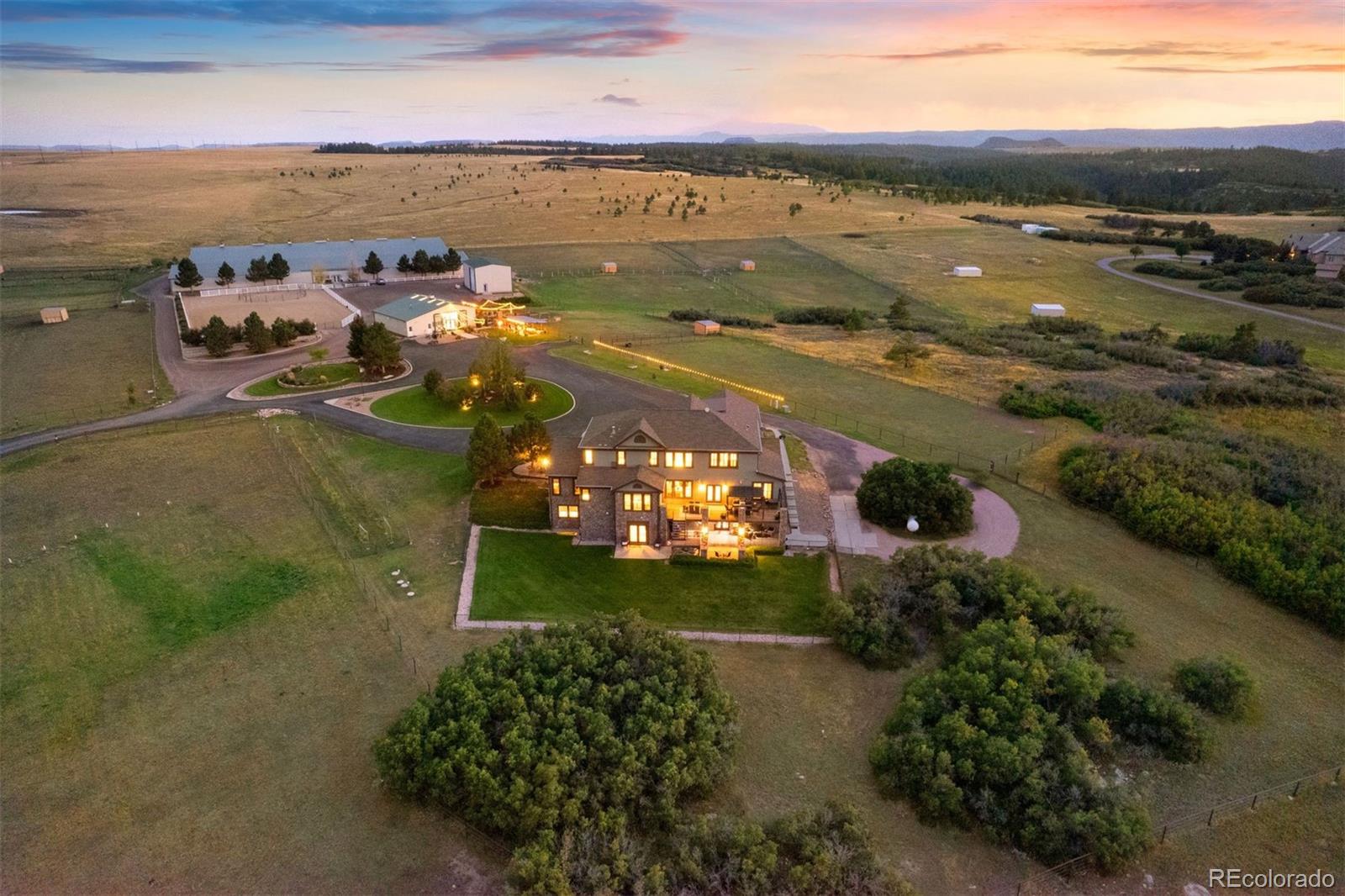 2940 Canon Ridge Road Castle Rock, CO 80104 - Photo 3 of 49 a view of a lake with lawn chairs