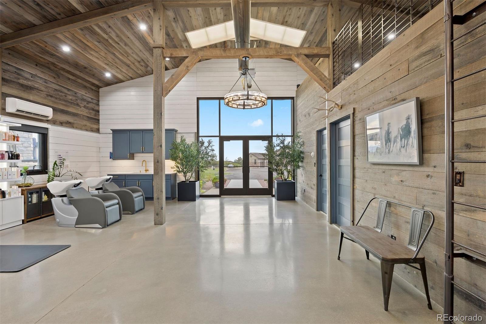 2940 Canon Ridge Road Castle Rock, CO 80104 - Photo 33 of 49 a view of a livingroom with furniture and windows