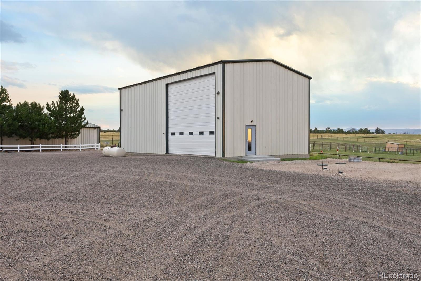 2940 Canon Ridge Road Castle Rock, CO 80104 - Photo 43 of 49 a view of a house with an outdoor space