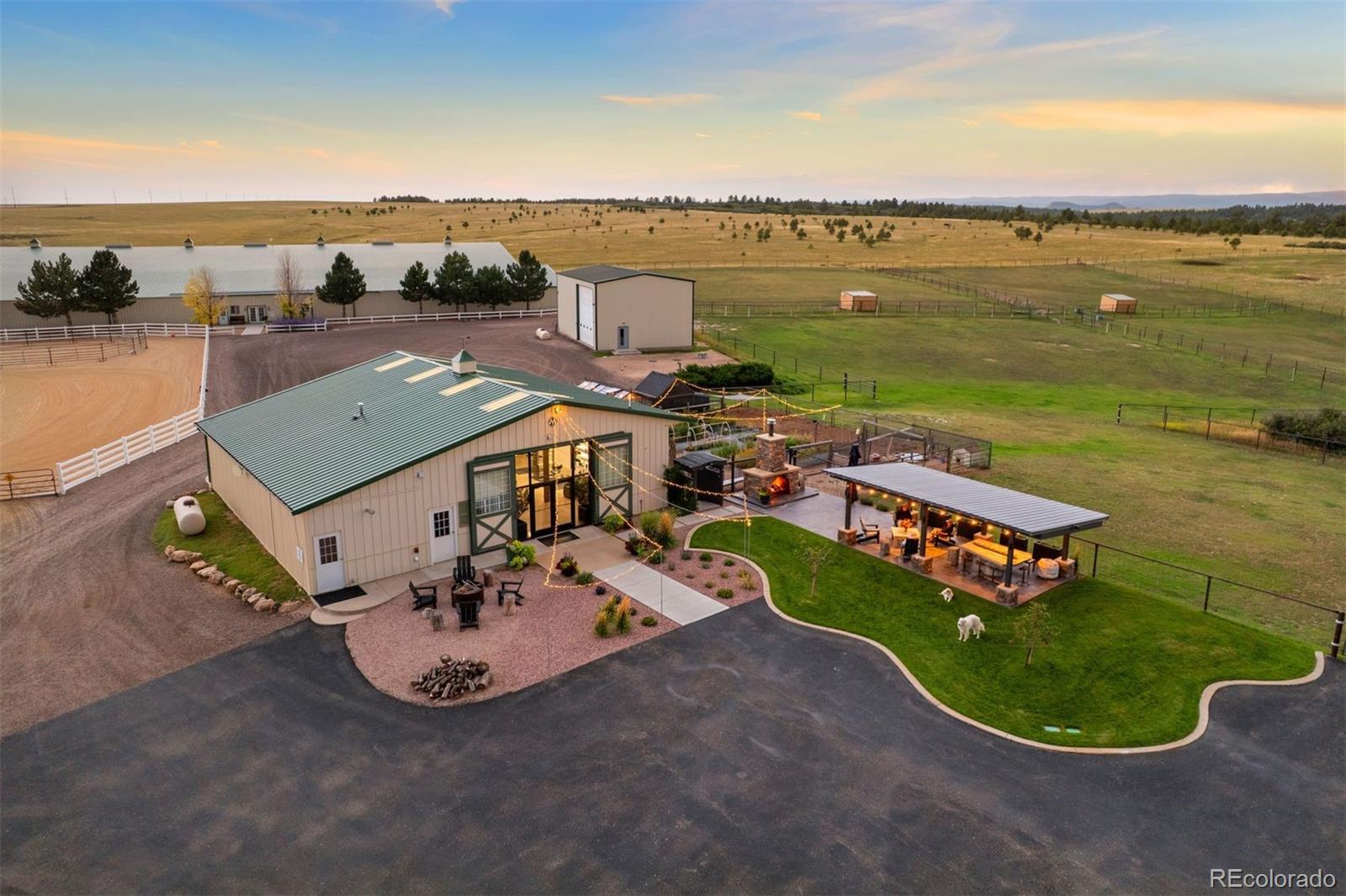 2940 Canon Ridge Road Castle Rock, CO 80104 - Photo 6 of 49 an aerial view of a house with outdoor space and ocean view