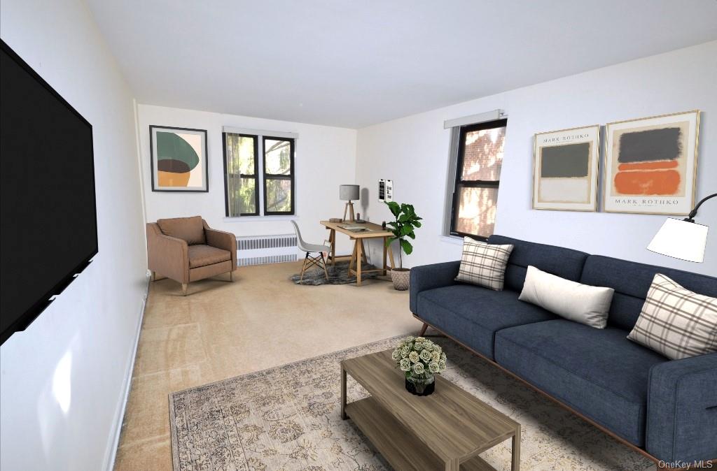 142 Garth Road, Unit 2J Scarsdale, NY 10583 - Photo 1 of 1 a living room with furniture and a flat screen tv with wooden floor
