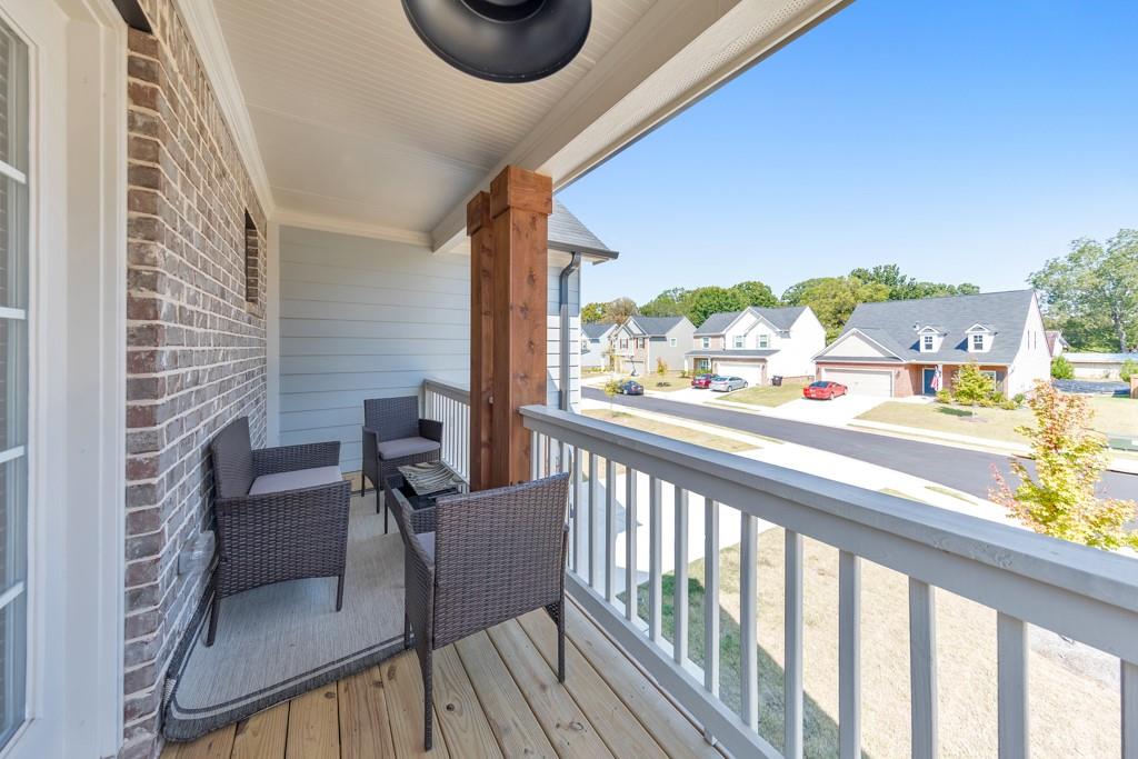 3146 Dowsing Lane Powder Springs, GA 30127 - Photo 26 of 42 a view of a chairs and table in the balcony