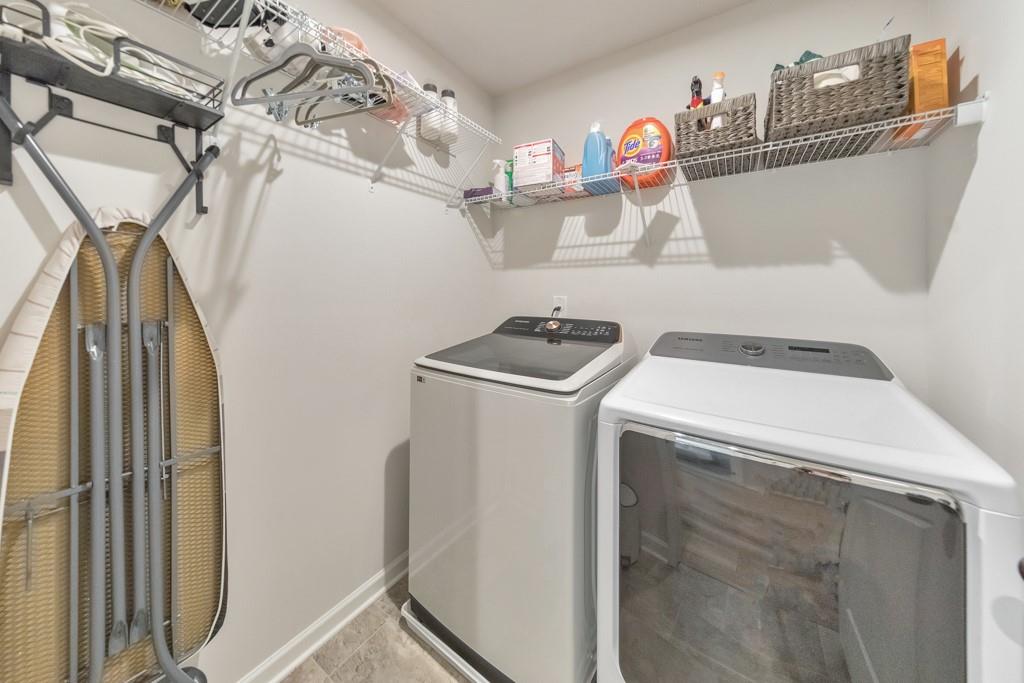 3146 Dowsing Lane Powder Springs, GA 30127 - Photo 30 of 42 a utility room with dryer and washer