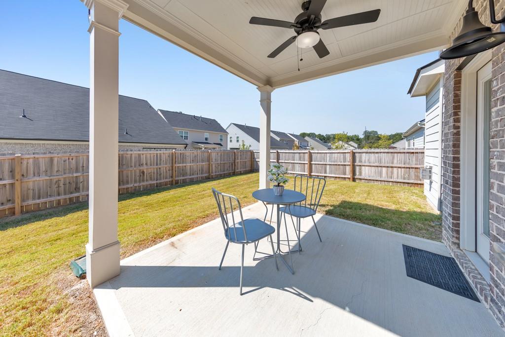 3146 Dowsing Lane Powder Springs, GA 30127 - Photo 32 of 42 a view of a swimming pool with a couches in a patio