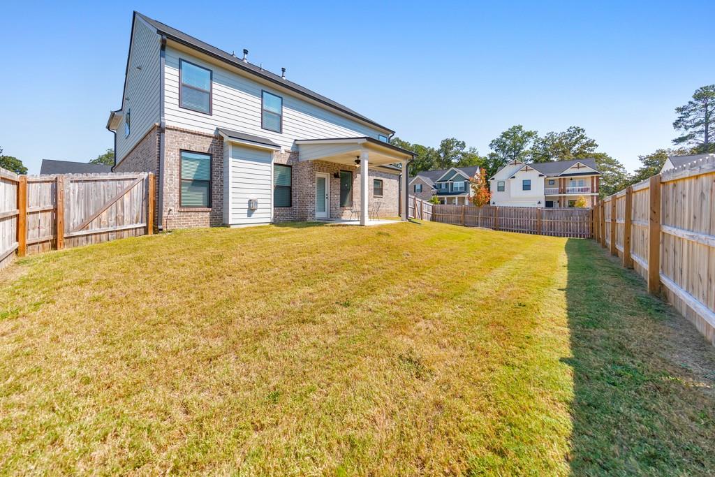 3146 Dowsing Lane Powder Springs, GA 30127 - Photo 35 of 42 a front view of house along with trees
