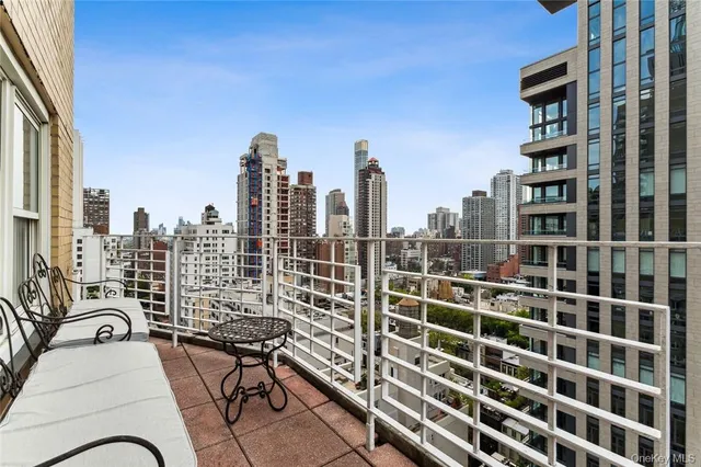 a view of a city with tall buildings