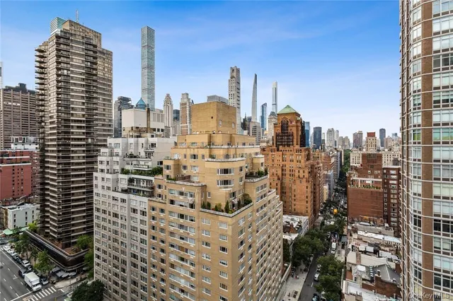 a view of a city with tall buildings