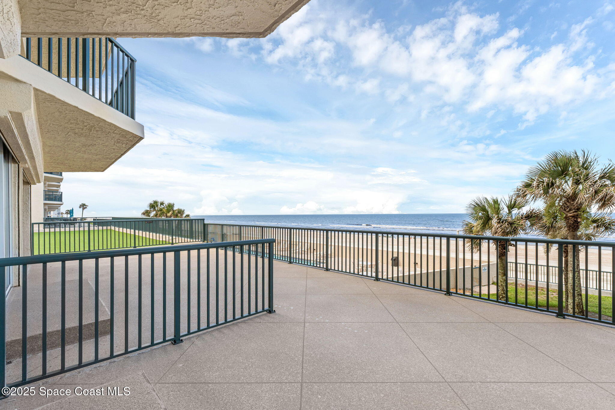 4631 South Atlantic Avenue, Unit 8102 Port Orange, FL 32127 - Photo 26 of 27 a balcony with outdoor view