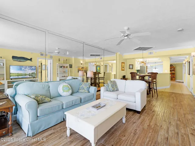 a kitchen with stainless steel appliances a refrigerator and a stove top oven