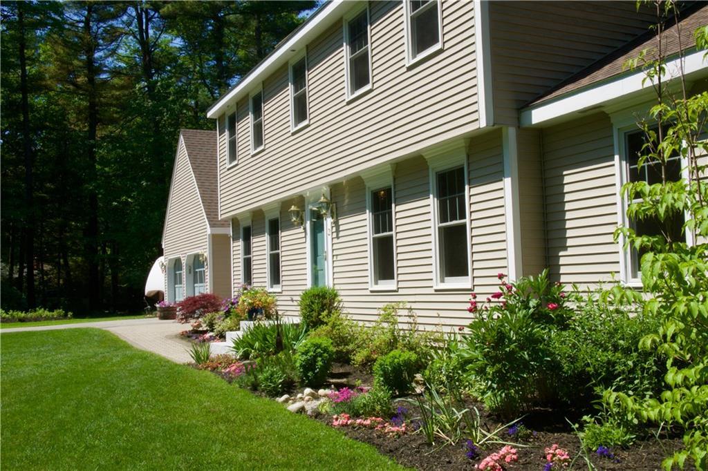 2 Hemlock Road Brunswick, ME 04011 - Photo 2 of 34 The home is accented by lovely...